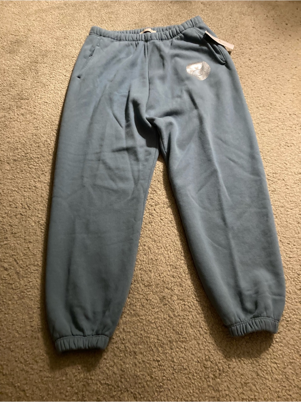 Woman’s XL blue sweatpants.